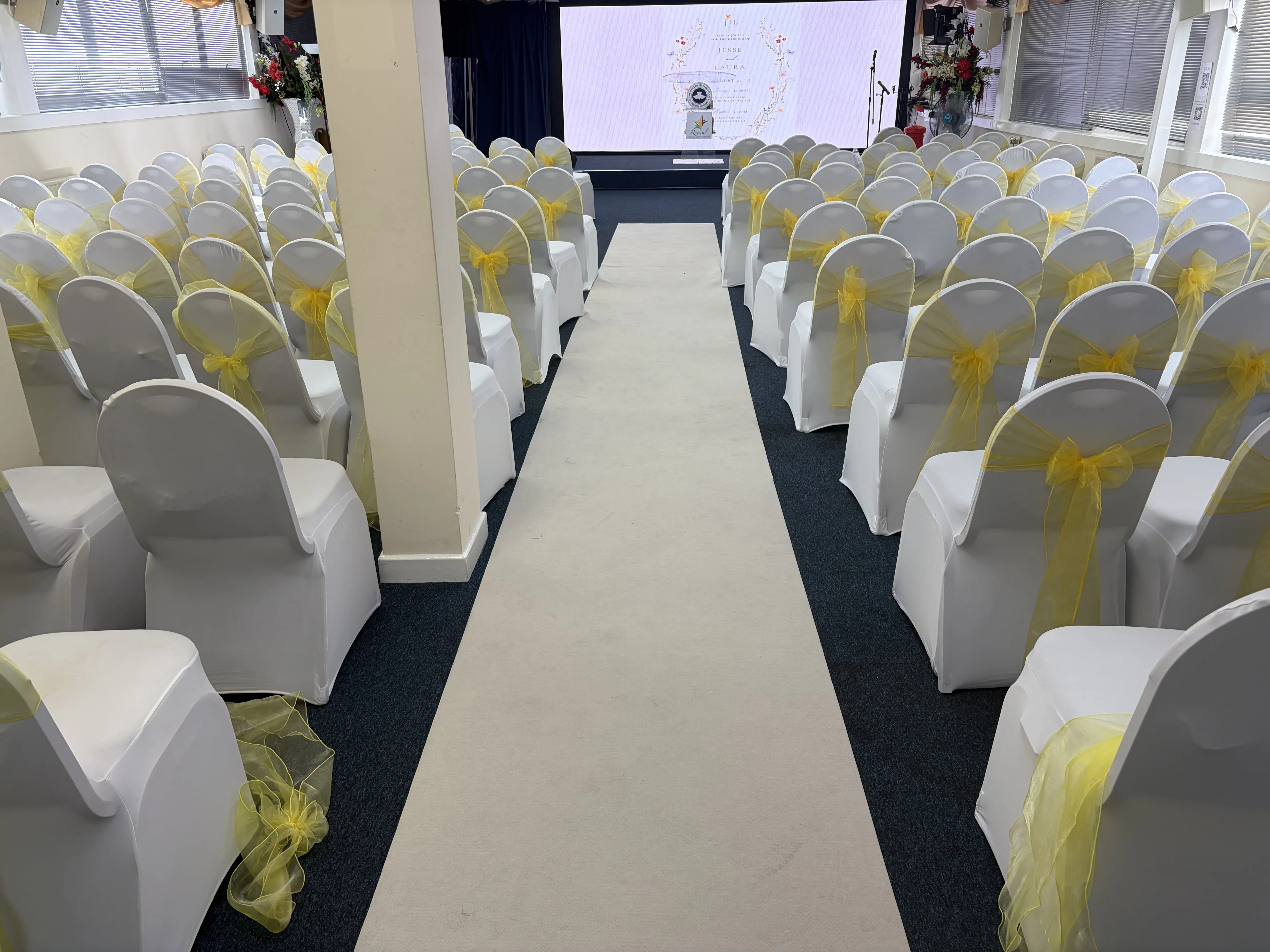 Decorated wedding seating inside The Revive Centre